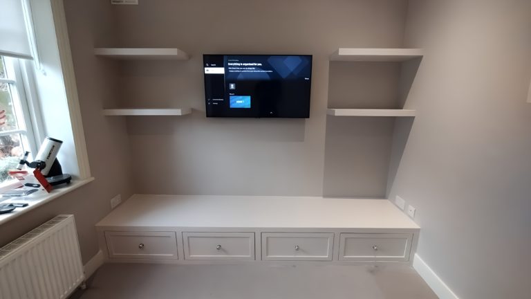 Elevate Your Space: The Benefits of Installing a Built-In TV Wall with Storage and Floating Shelves